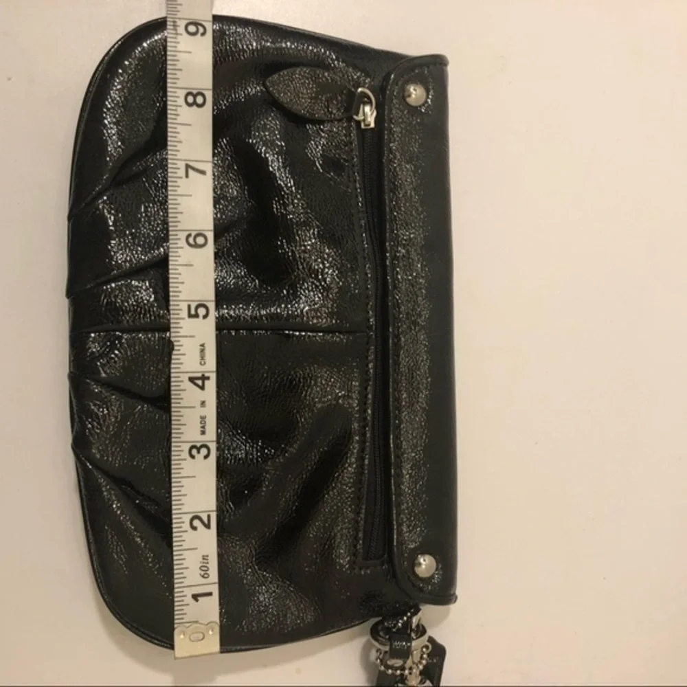 Coach black patent leather wristlet clutch bag